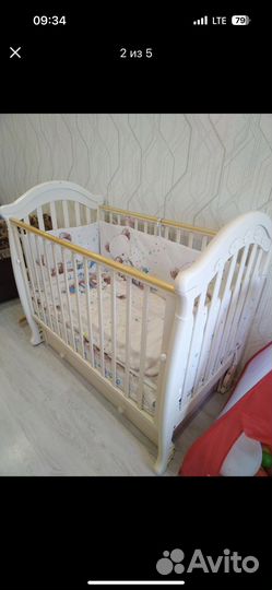 Детская кроватка с маятником