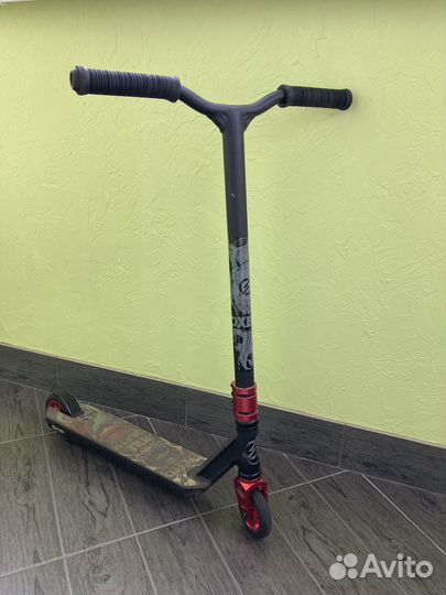 Трюковой самокат Оxelo