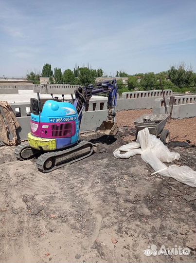 Услуги миниэкскаватора