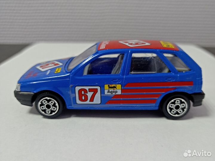 Модель Fiat Tipo rally. Bburago. 1:43