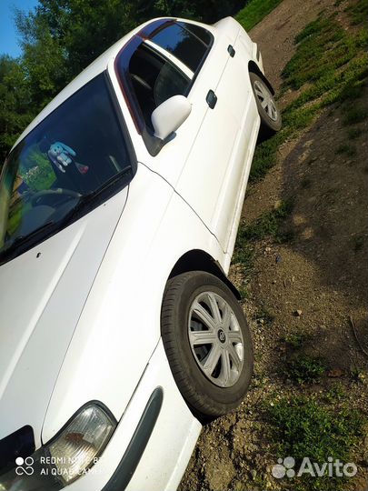 Nissan Sunny 1.3 AT, 2001, 300 000 км