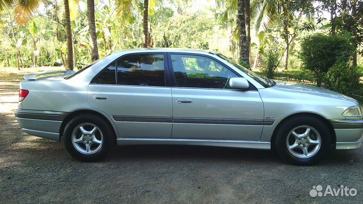 Накладки Gt на Toyota Carina 210 дорестайл