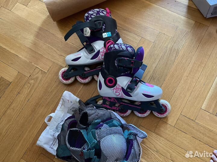 Роликовые коньки