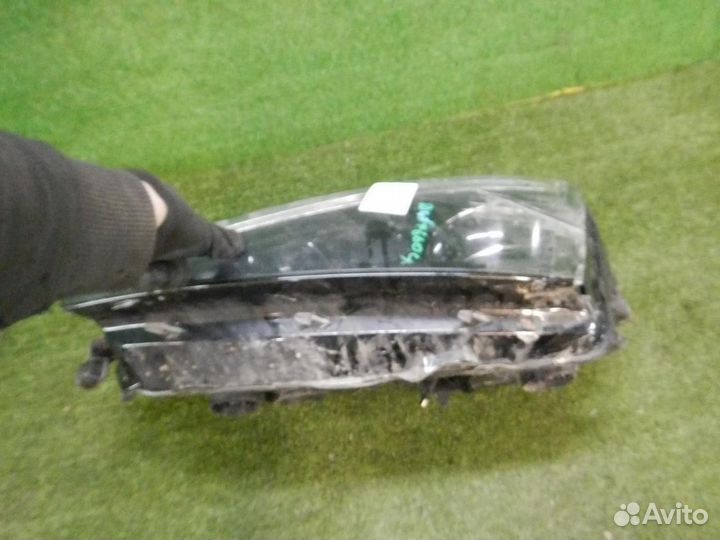 Фара левая Skoda Rapid