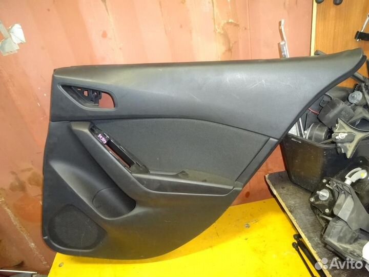 Обшивка двери прав.зад. Maz/ Axela,Mazda 3/ BM/ се