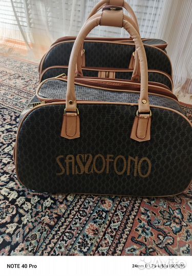 Дорожные сумки с колёсиками и ручкой