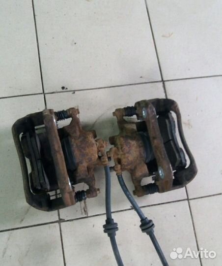 Суппорт передний Chevrolet Aveo T300