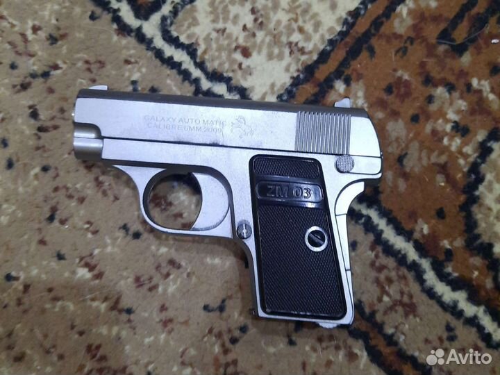 Игрушечный пистолет