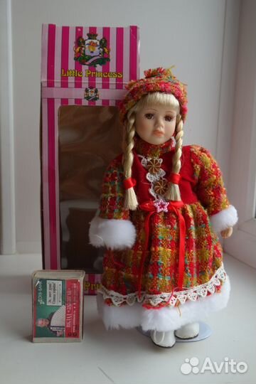 Продам керамическую куклу