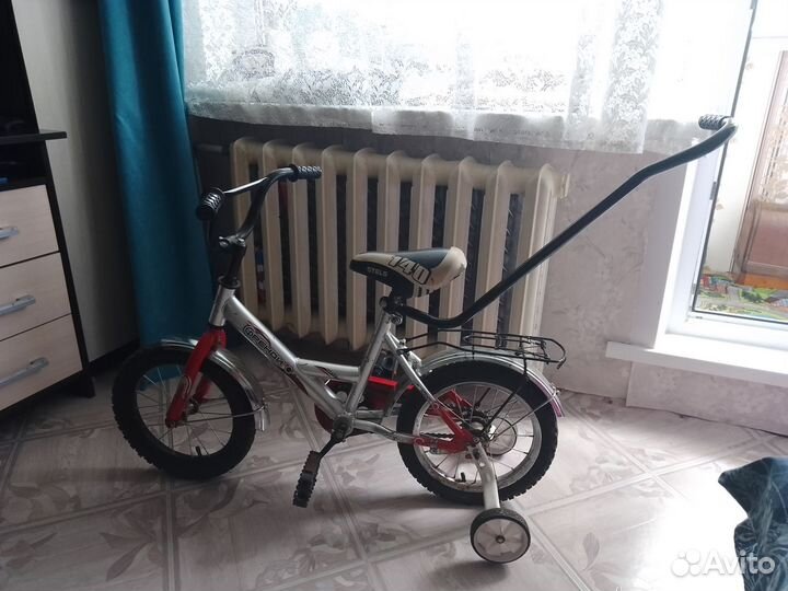 Детский велосипед с родительской ручкой