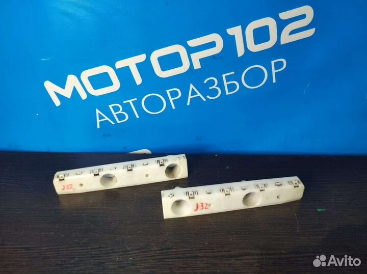 Кронштейн переднего бампера левый Nissan Teana j32