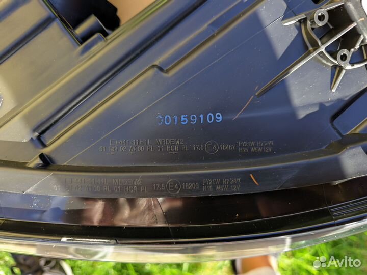 Фара передняя левая Тигуан