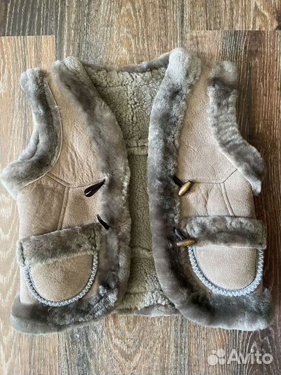 Жилетка теплая