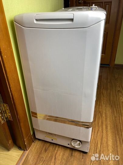 Стиральная машина с вертикальной загрузкой Candy