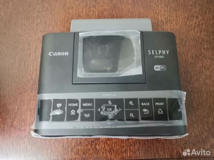 CanonSelphy CP1300+аккумулятор+комплект для печати
