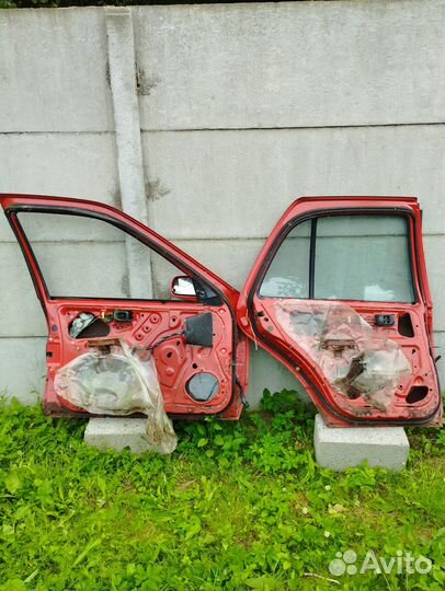 Двери nissan sanny 92г