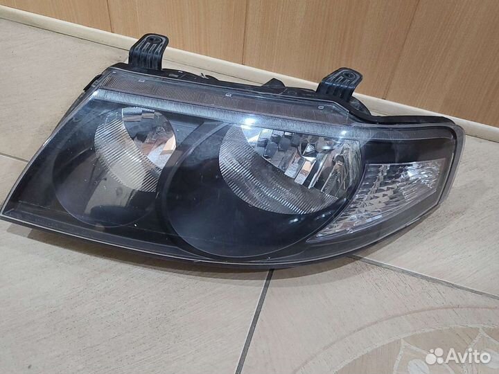 Фара левая Nissan Almera Classic