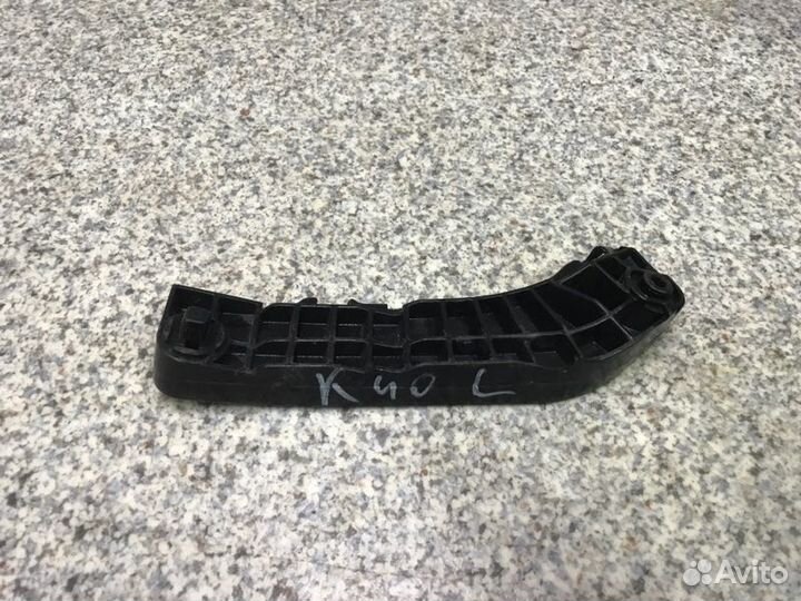 Кронштейн бампера лев. перед. Toyota Camry