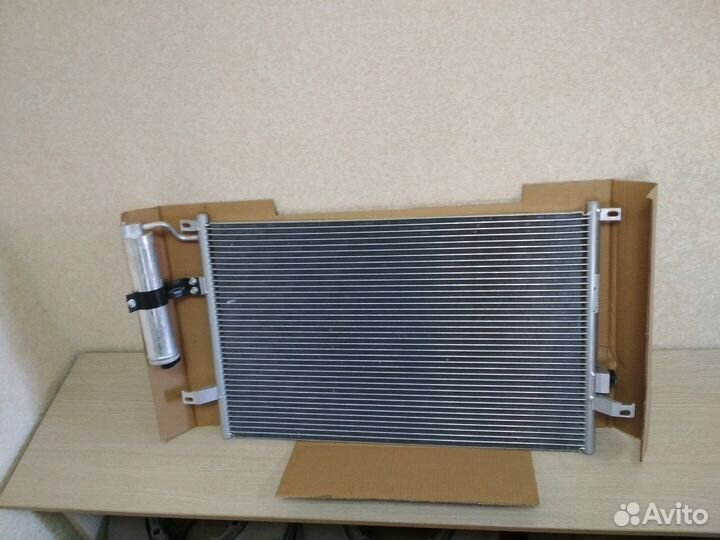 Радиатор кондиционера Chevrolet Lacetti