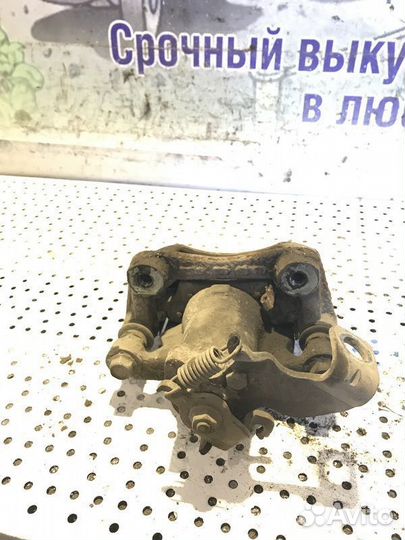 Суппорт тормозной задний левый Kia Soul