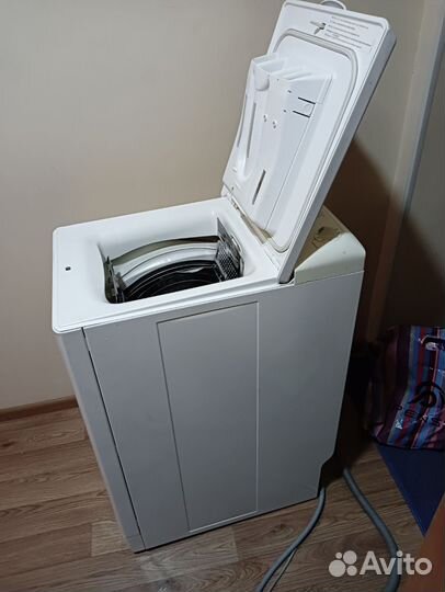 Стиральная машина с вертикальной загрузкой