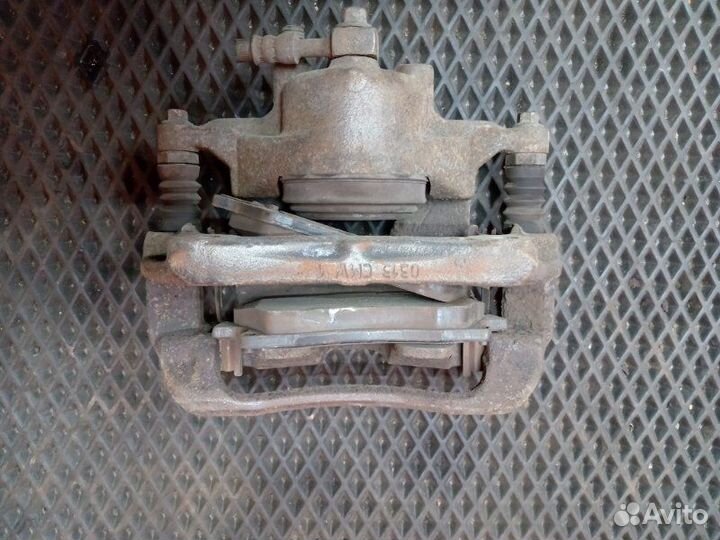 Суппорт передний левый Chevrolet Cruze J305 F16D4