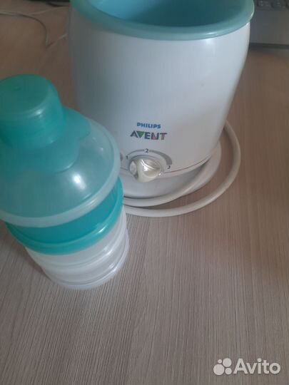 Бутылочки для кормления и подогреватель