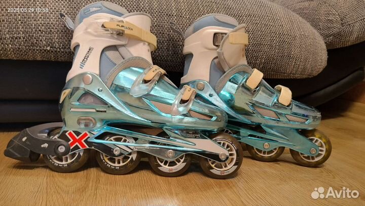 Роликовые коньки