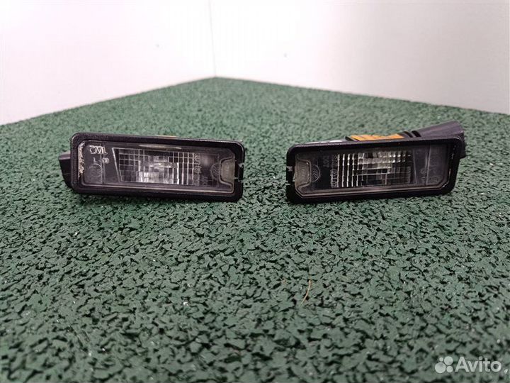 Фонарь подсветки номера Vw Passat B7 2011