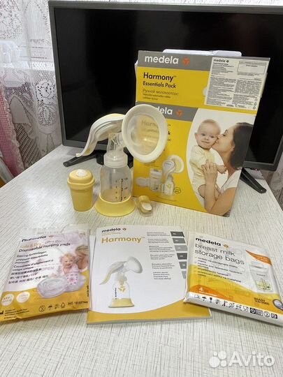 Молокоотсос ручной medela