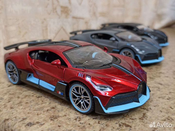 Bugatti Divo красный в масштабе 1 32