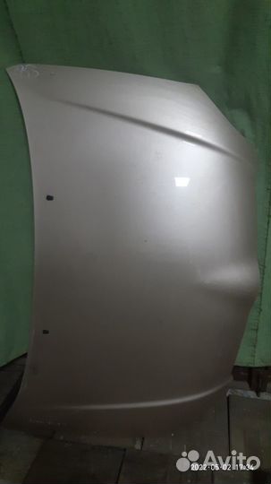 Капот от Toyota runx 2002-2004 года