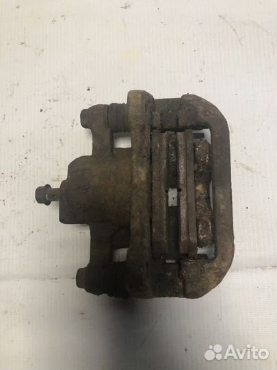 Суппорт задний левый Chevrolet Lacetti