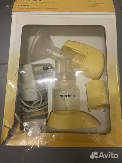 Молокоотсос medela электрический