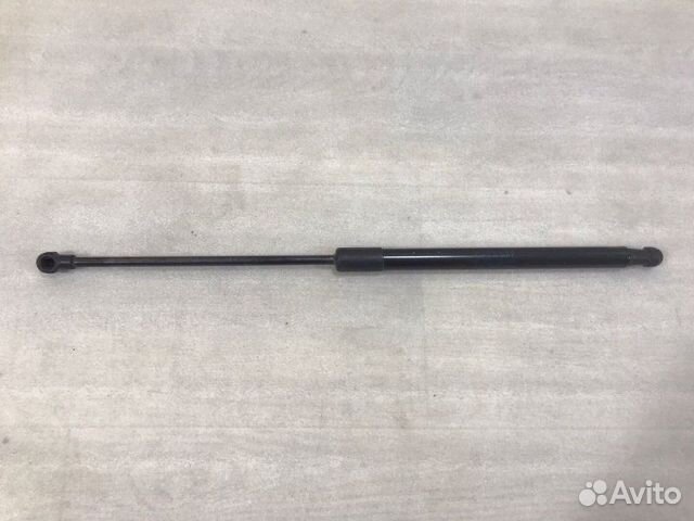 Амортизатор двери багажника Лада Гранта 2011