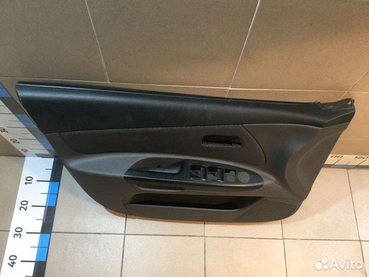 Обшивка двери передней левой Kia Rio 2005-2011