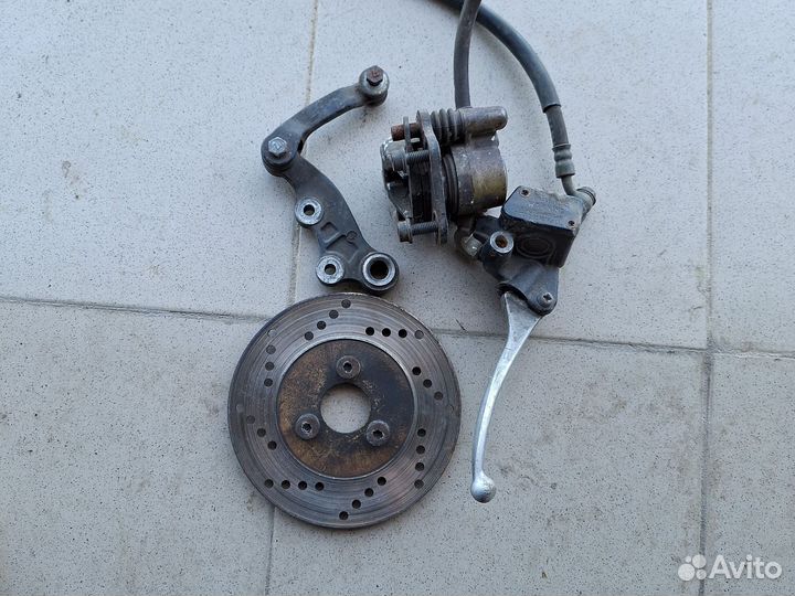 Дисковый тормоз Suzuki Sepia ZZ в сборе