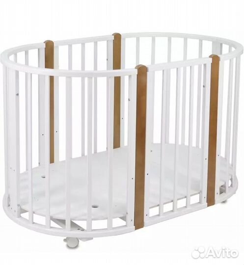 Детская кроватка с маятником