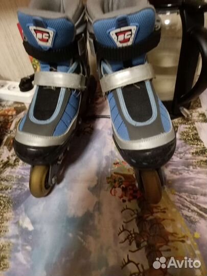 Роликовые коньки