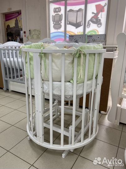 Детская кроватка круглая овальная с маятником