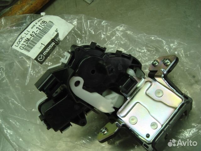 Мазда Замок крышки багажника (новый) Mazda 2011-19
