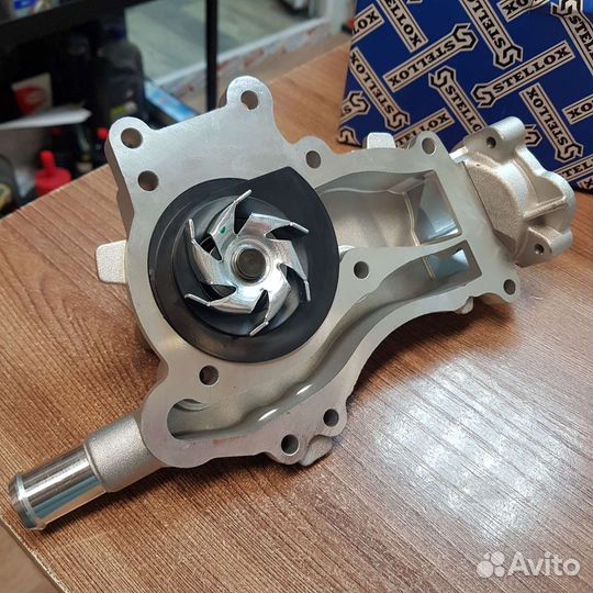 Насос водяной Opel Astra J 1.4, Corsa D