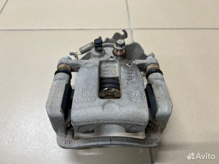 Суппорт тормозной задний левый Kia Soul 29000км