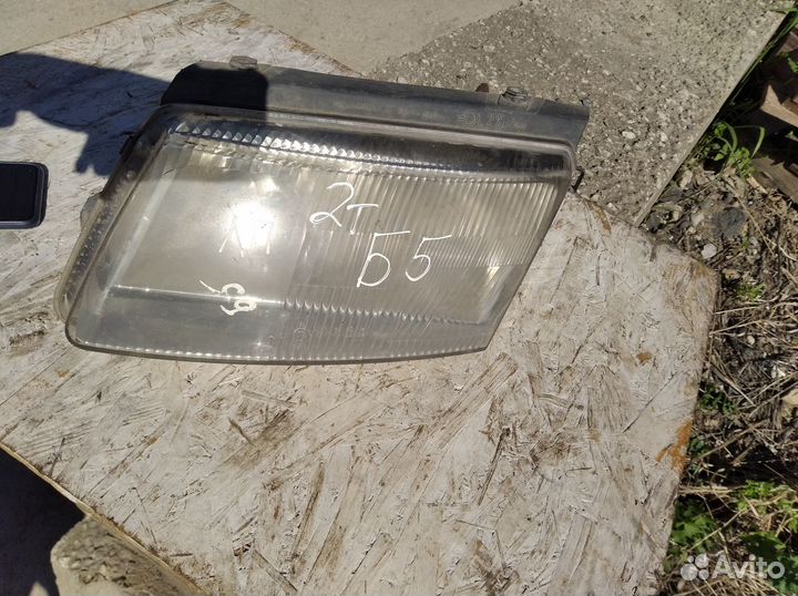 Фара Фольцваген Пассат Б5 передняя левая