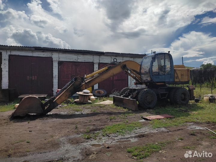 Колёсный экскаватор Твэкс ЕК-12, 2002