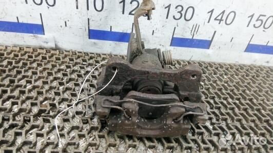 Суппорт тормозной задний левый nissan primera P12