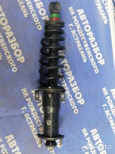 Задняя стойка амортизатора Toyota Progres седан