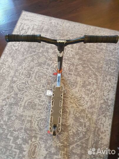Трюковой самокат оxelo