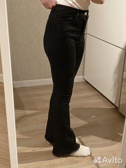 Джинсы клеш женские