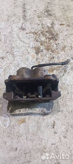 Суппорт передний левый